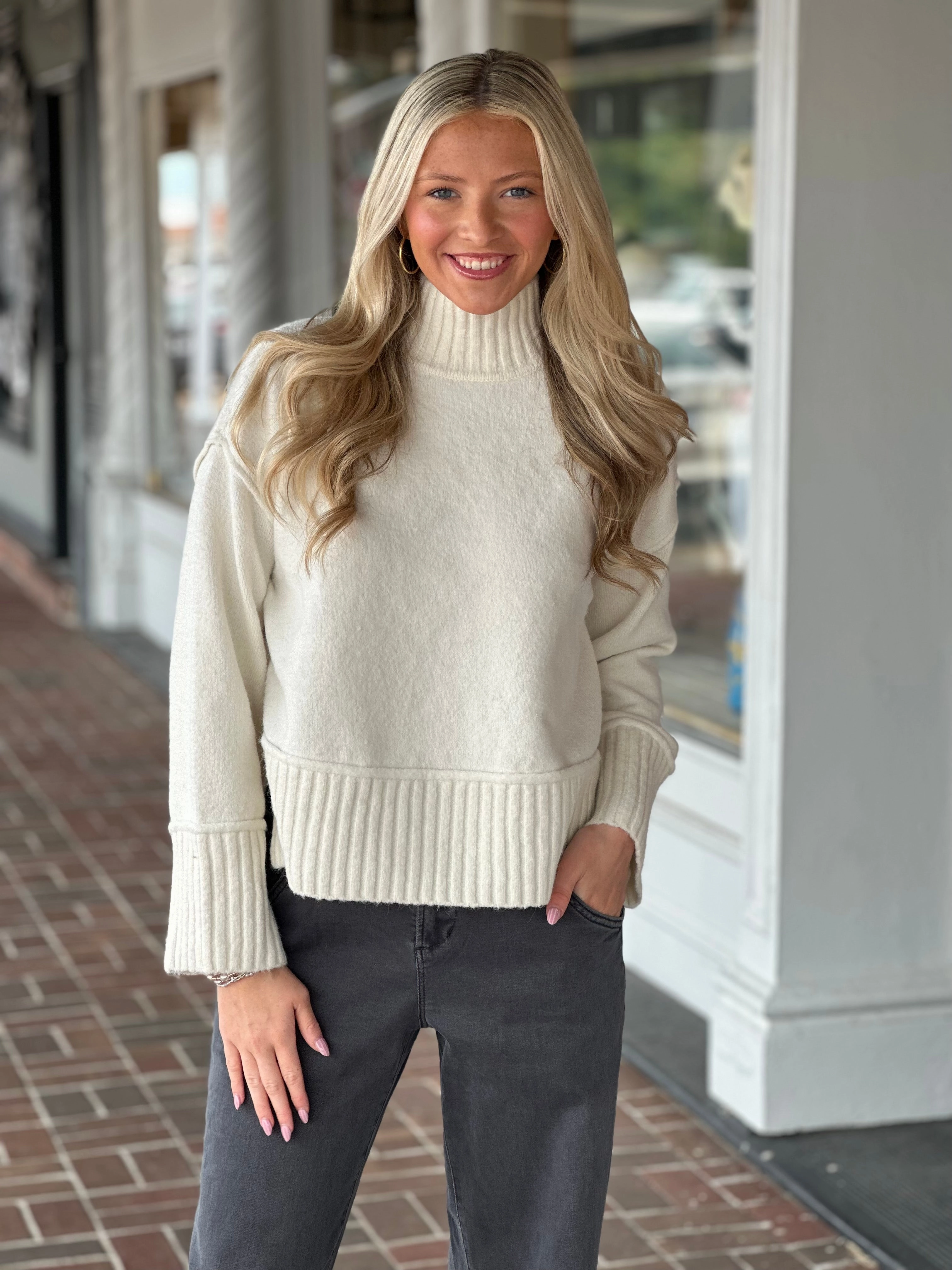 The Thalia Turtleneck Sweater in Ivory No Iron Fabric LowImpact Manufacturing