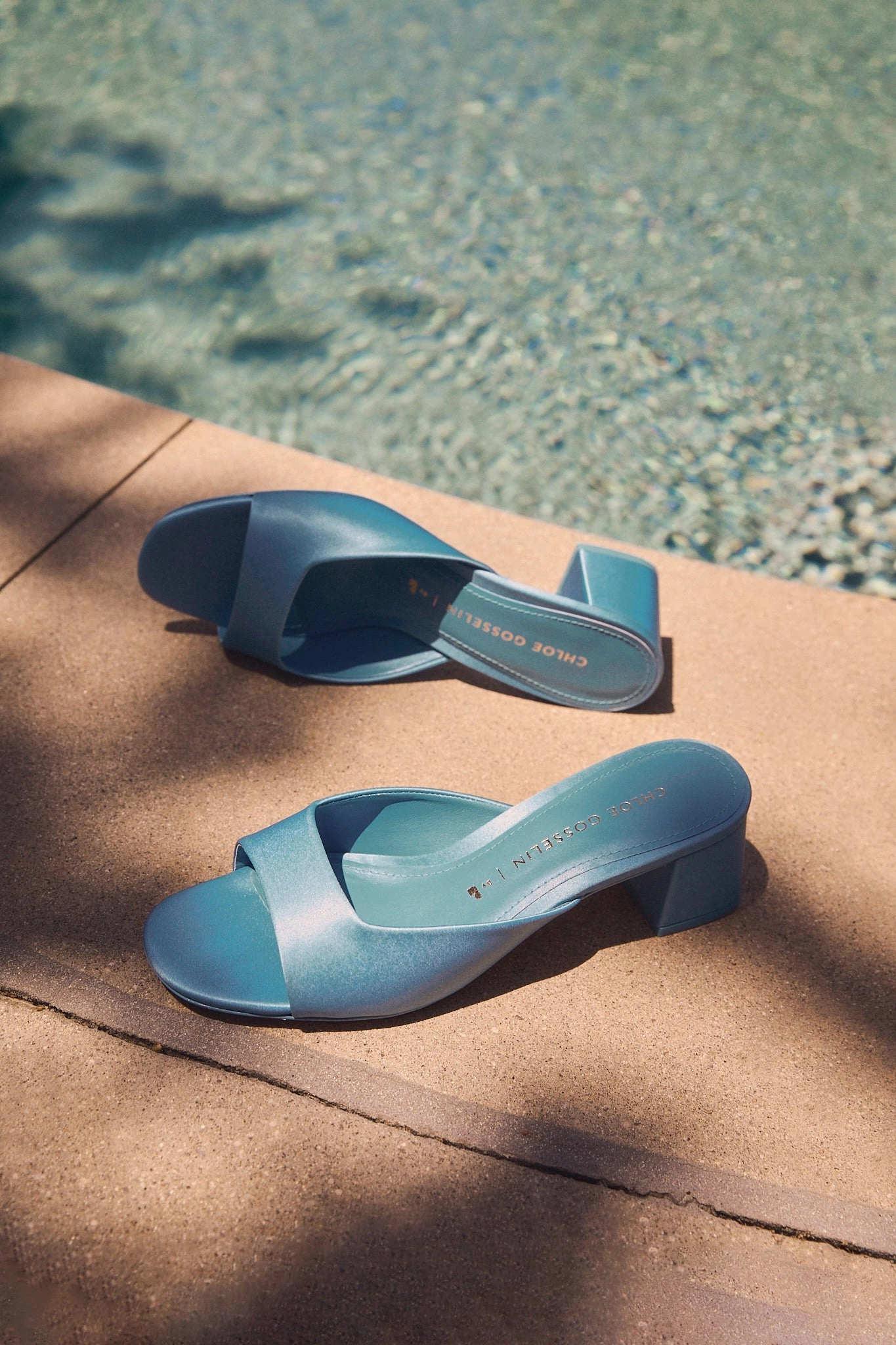 Ocean Walk Chloe Gosselin by Larroud Anah Mule In Blue Satin