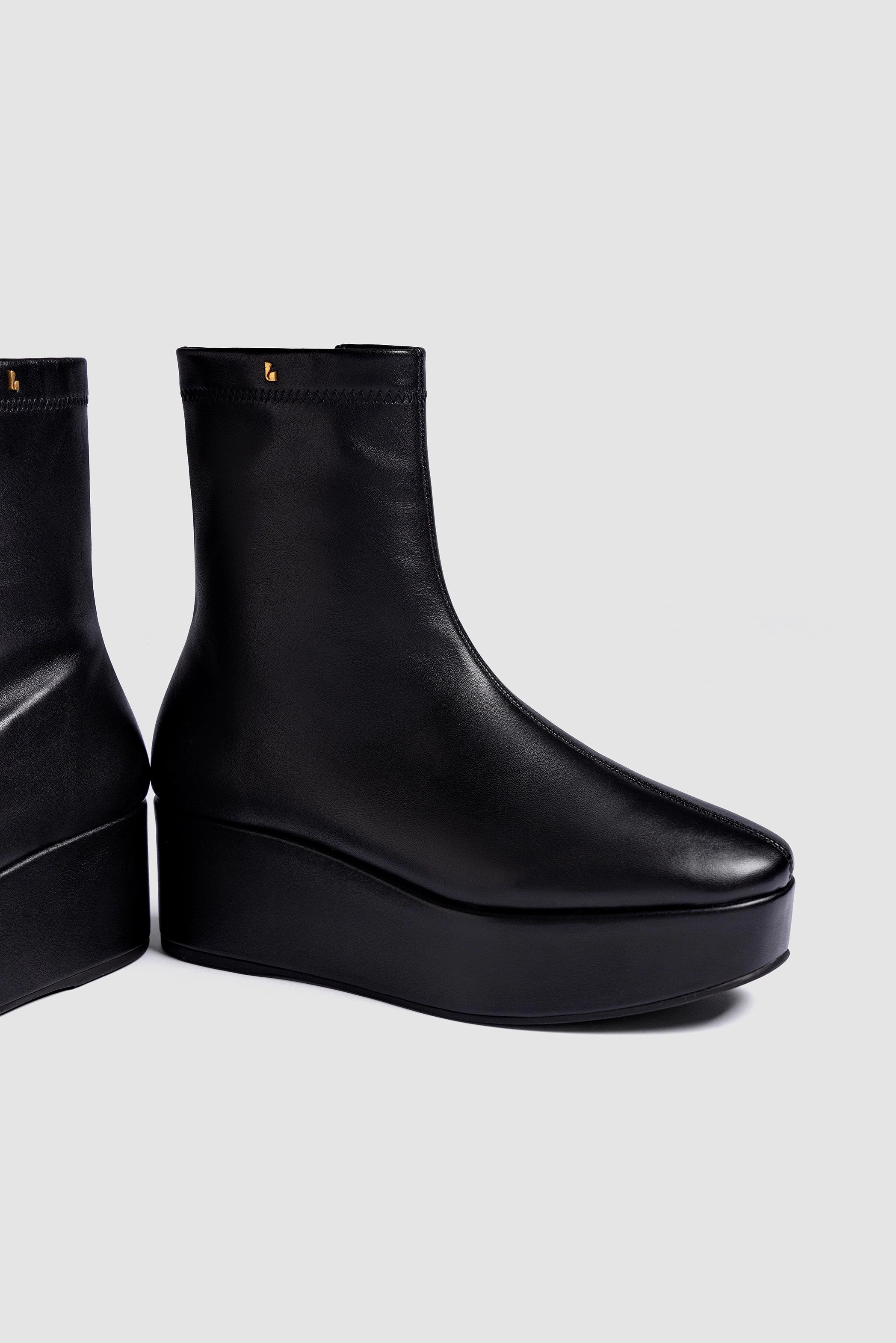 Moist Guard Dani Flatform Boot In Black Leather