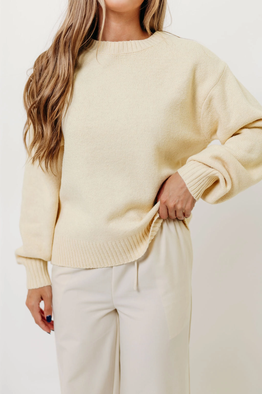 Relaxed Silhouette NoRoll Hem Technology Desiree Sweater in Mellow Yellow