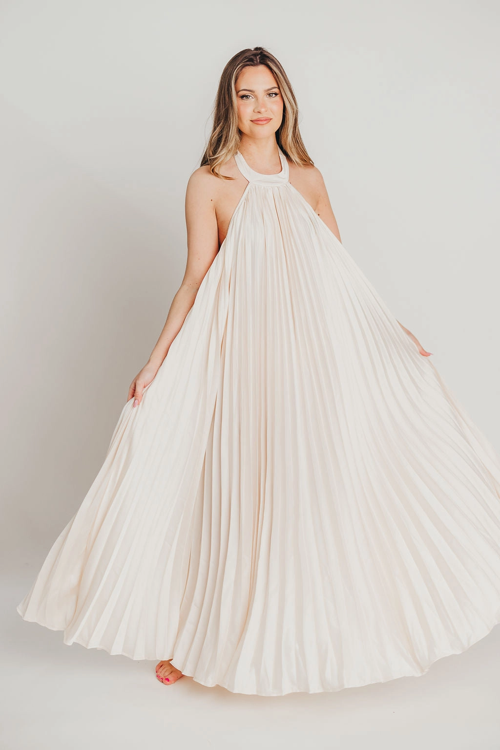 Maren Pleated Halter Maxi Dress in Cream - Bump Friendly Calm Lines Crisp Look