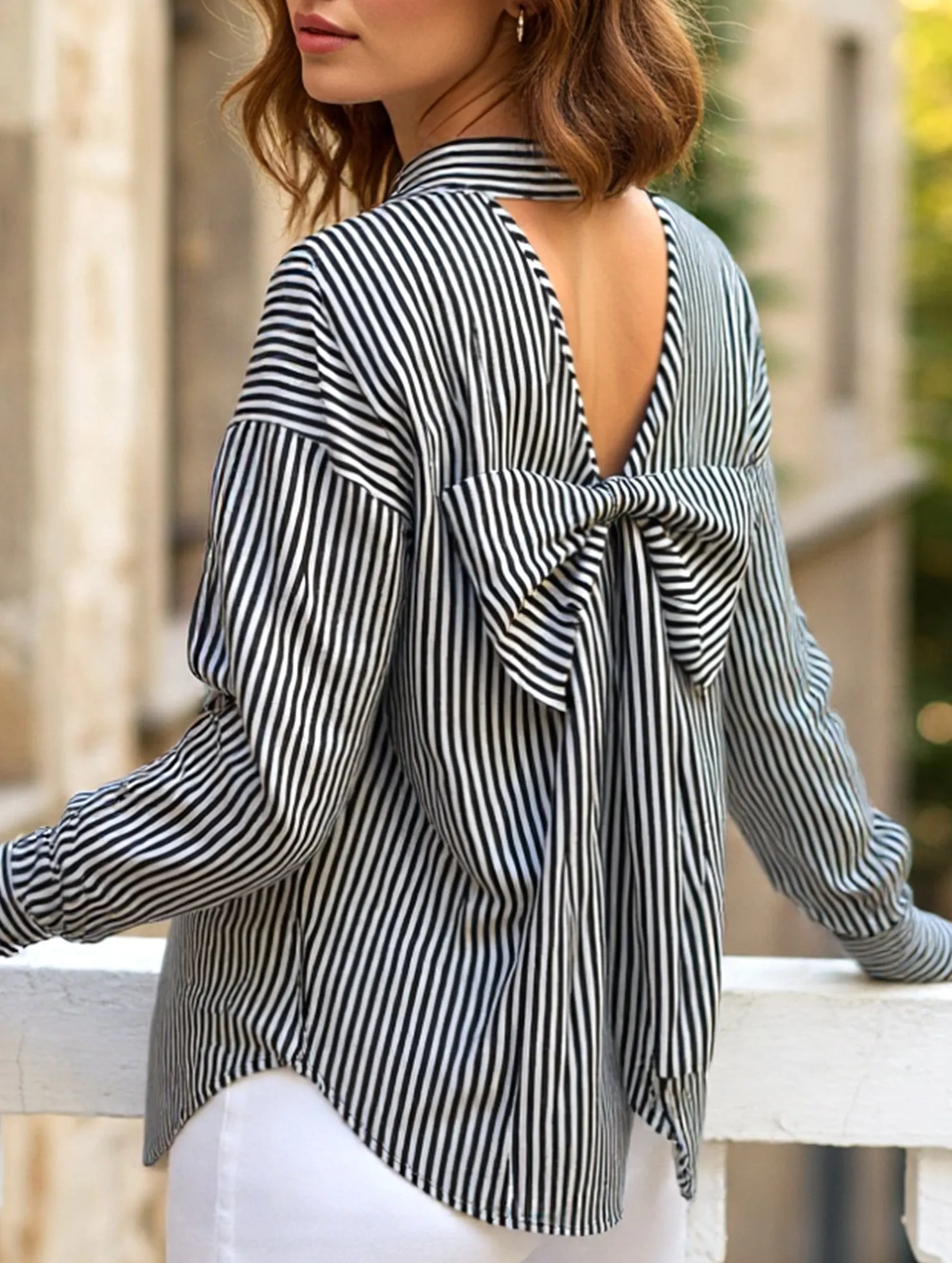 A striped printed long-sleeved shirt with a bow BreathableBack Printed T-shirt