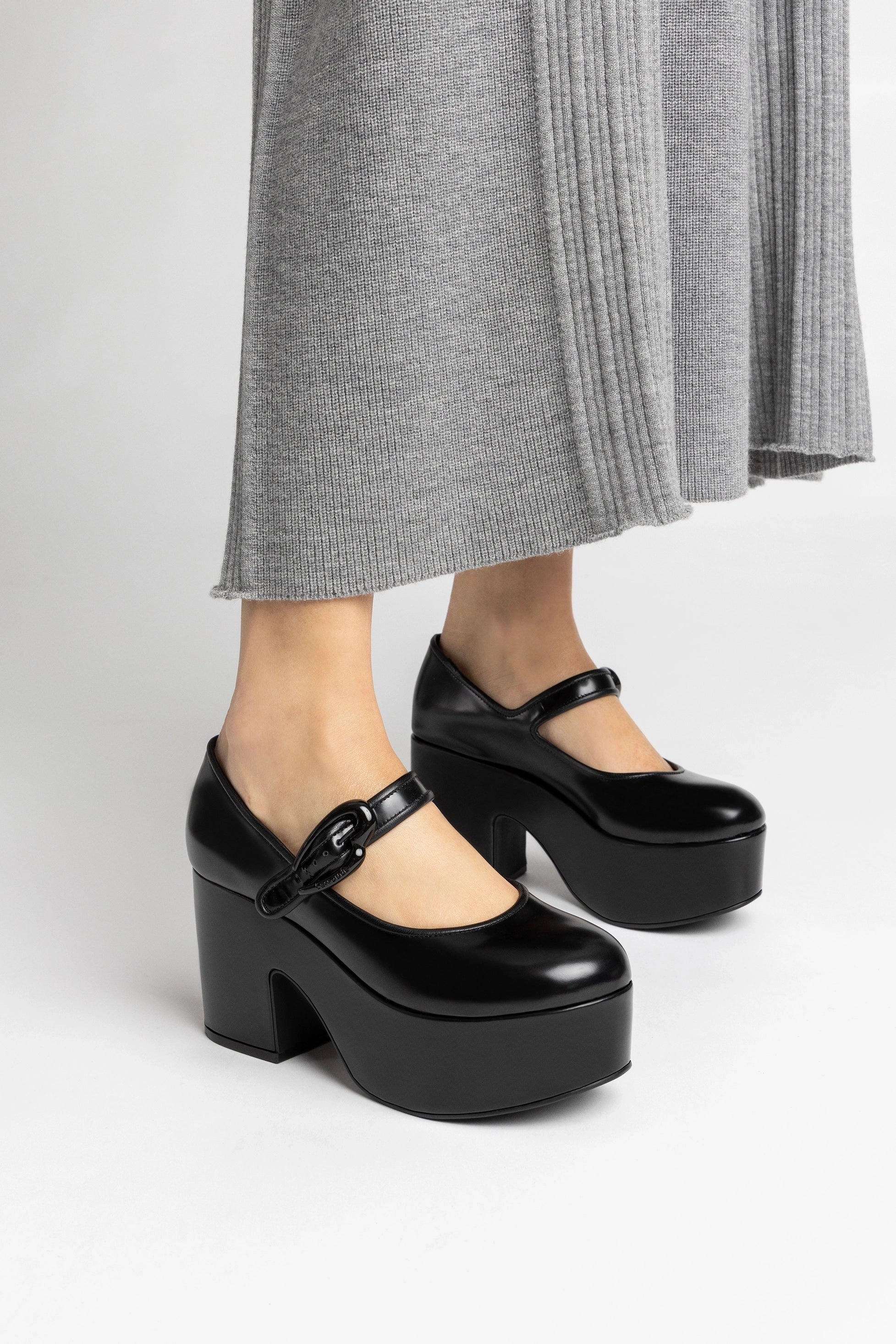 Verona Flatform In Black Box Leather Rolling Motion Support